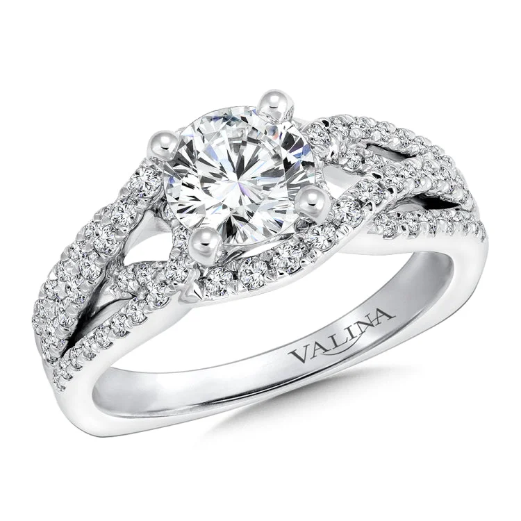 An open weave of diamonds embraces the center stone creating fluidity and elegance to this stunning design.